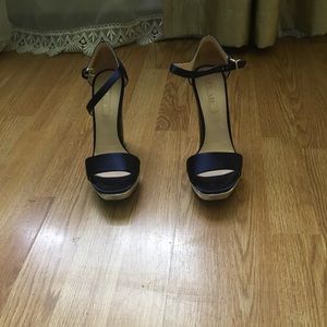 High heel and platform sandals by Prada